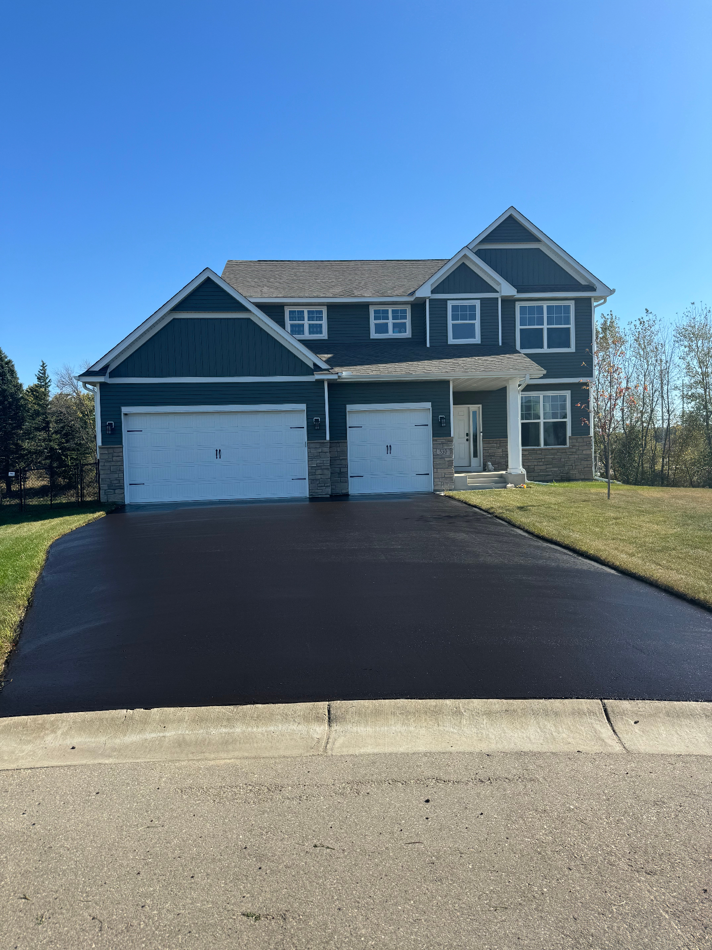 Driveway after seal coating - Project 2
